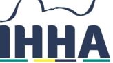 The IHHA 2023 logo in Rio depicts mountains, the Christ the Redeemer statue and a railway wheel.