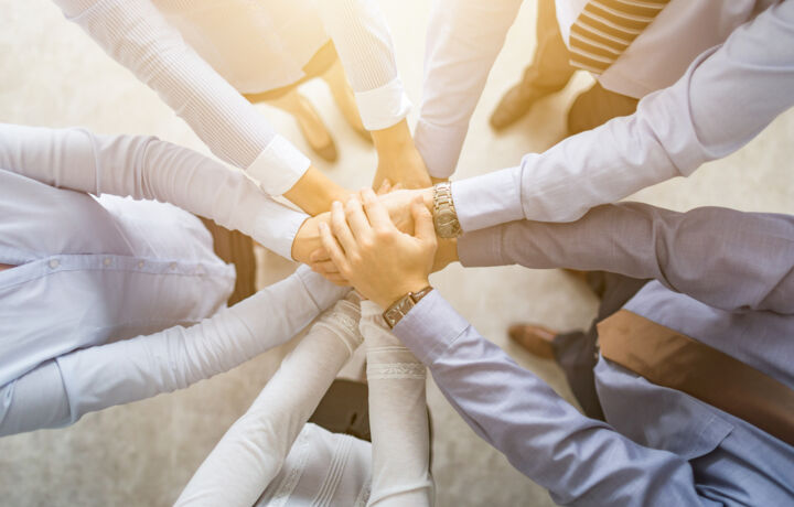 Hands for teamwork: symbol for partner network and collaboration.