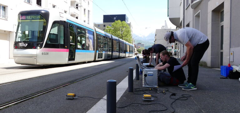 Getzner employees performing vibration analysis on tram tracks. Getzner employees performing vibration analysis on tram tracks.